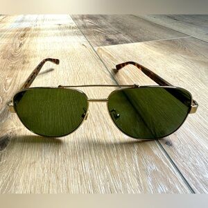 Gucci GG0528 Sunglasses (gold toned metal)